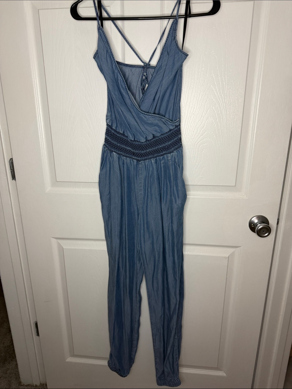 bebe Light Blue Sleeveless V-Neck Jumpsuit with Smocked Waist